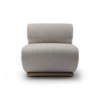 Gray upholstered armchair on a white background