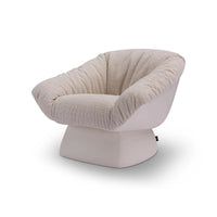 Modern chair with beige cushioned seat and backrest on a white background