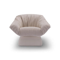 Beige textured armchair on a white background