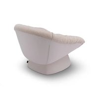 Modern chair with a curved design and beige cushion on a white background