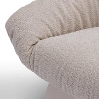 Close-up of a textured beige fabric on a white background