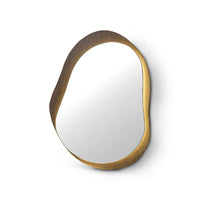 Gold-framed mirror on a white background