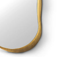 Gold-framed mirror on a white background