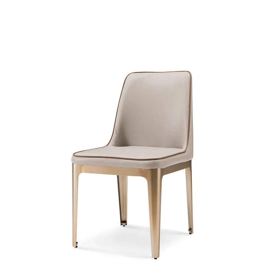 Beige chair with gold legs on a white background