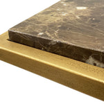 Close-up of a marble countertop with a wooden edge on a white background