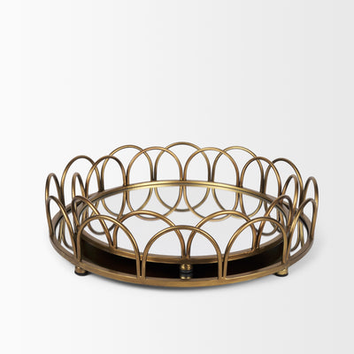 Two gold-colored metal serving trays with a geometric pattern.