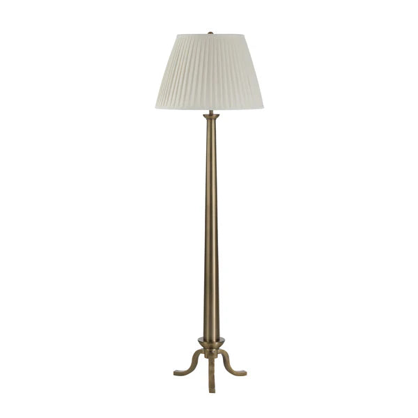 Floor lamp with a pleated white shade on a white background