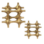Two gold decorative items with a textured, star-like design on a white background