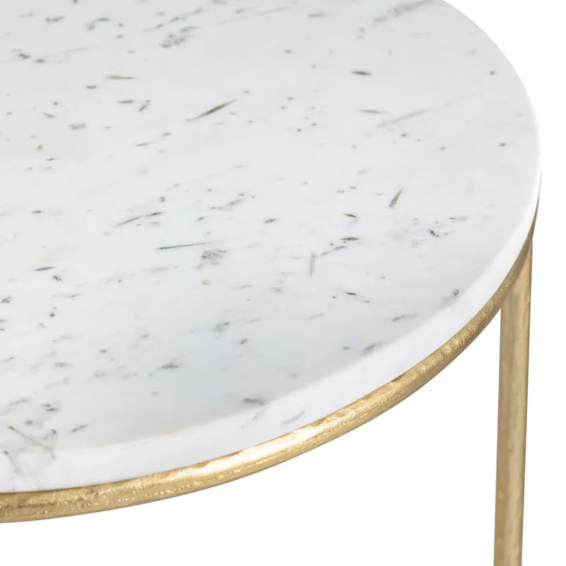 Round marble table with gold rim on a white background