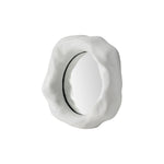 A middle Organic form mirror with a white background