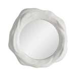 A large Organic form mirror with a white background