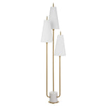 Floor lamp with three white lampshades and gold metal base on a white background