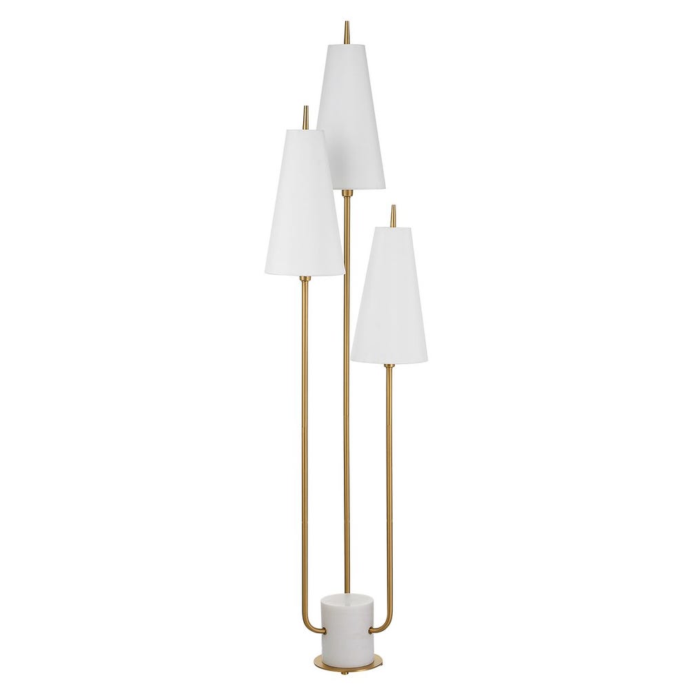 Floor lamp with three white lampshades and gold metal base on a white background