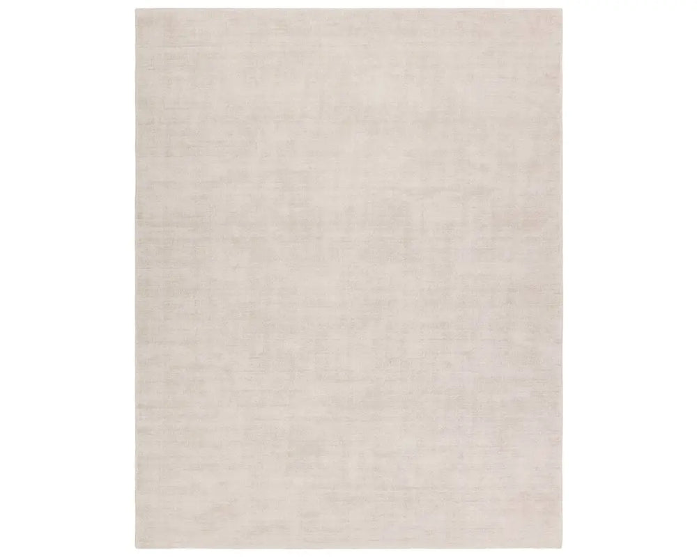 A light taupe area rug with a textured weave, handwoven from 100% pet yarn.