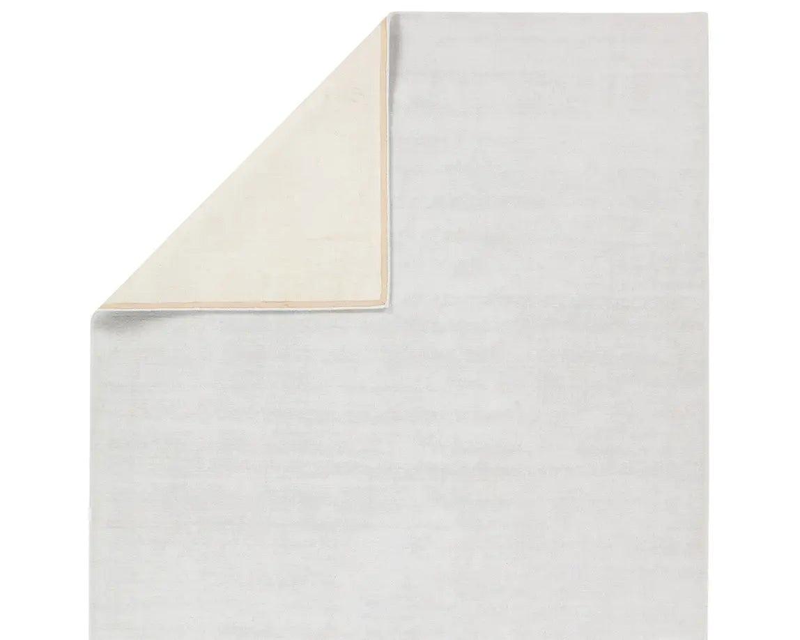 Fabian Solid Area Rug - Snow back