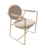 Modern chair with gold frame and beige cushion on a white background