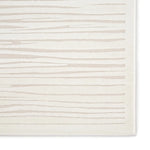 Textured rug with wavy lines on a white background