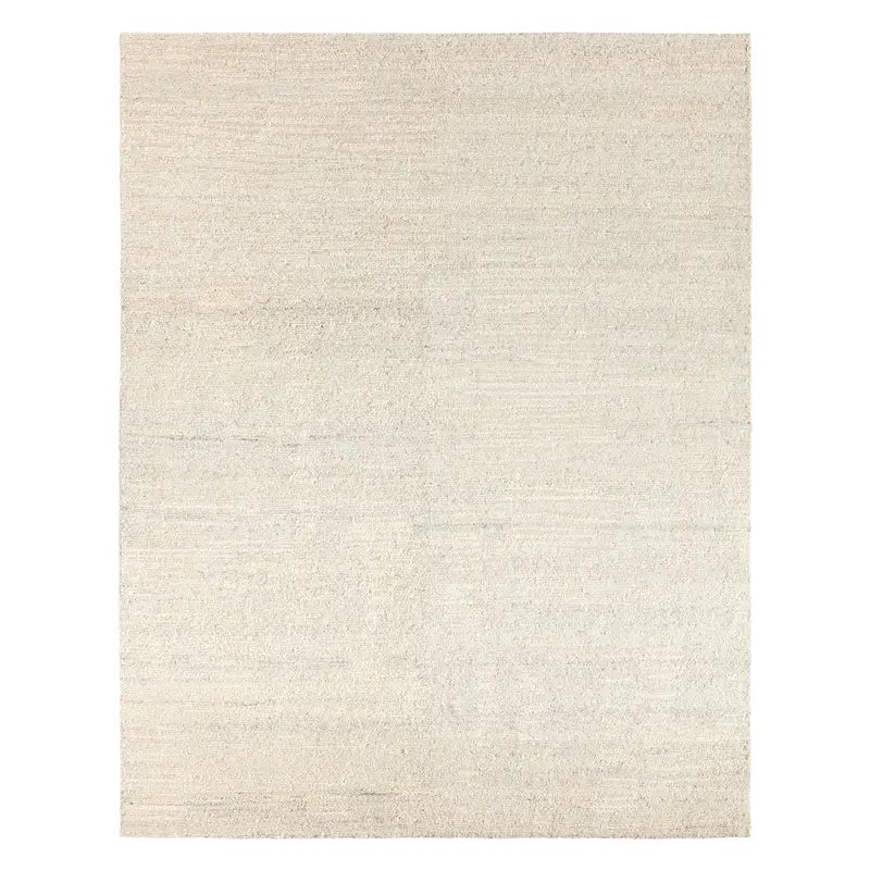 Beige area rug on a white background