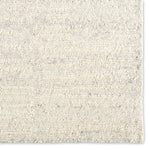 Close-up of a textured beige fabric swatch