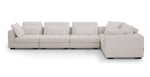 A beige 5 pieces sectional sofa with plush feather down back cushions, consisting of one armless chair and ottoman, designed for lounging.