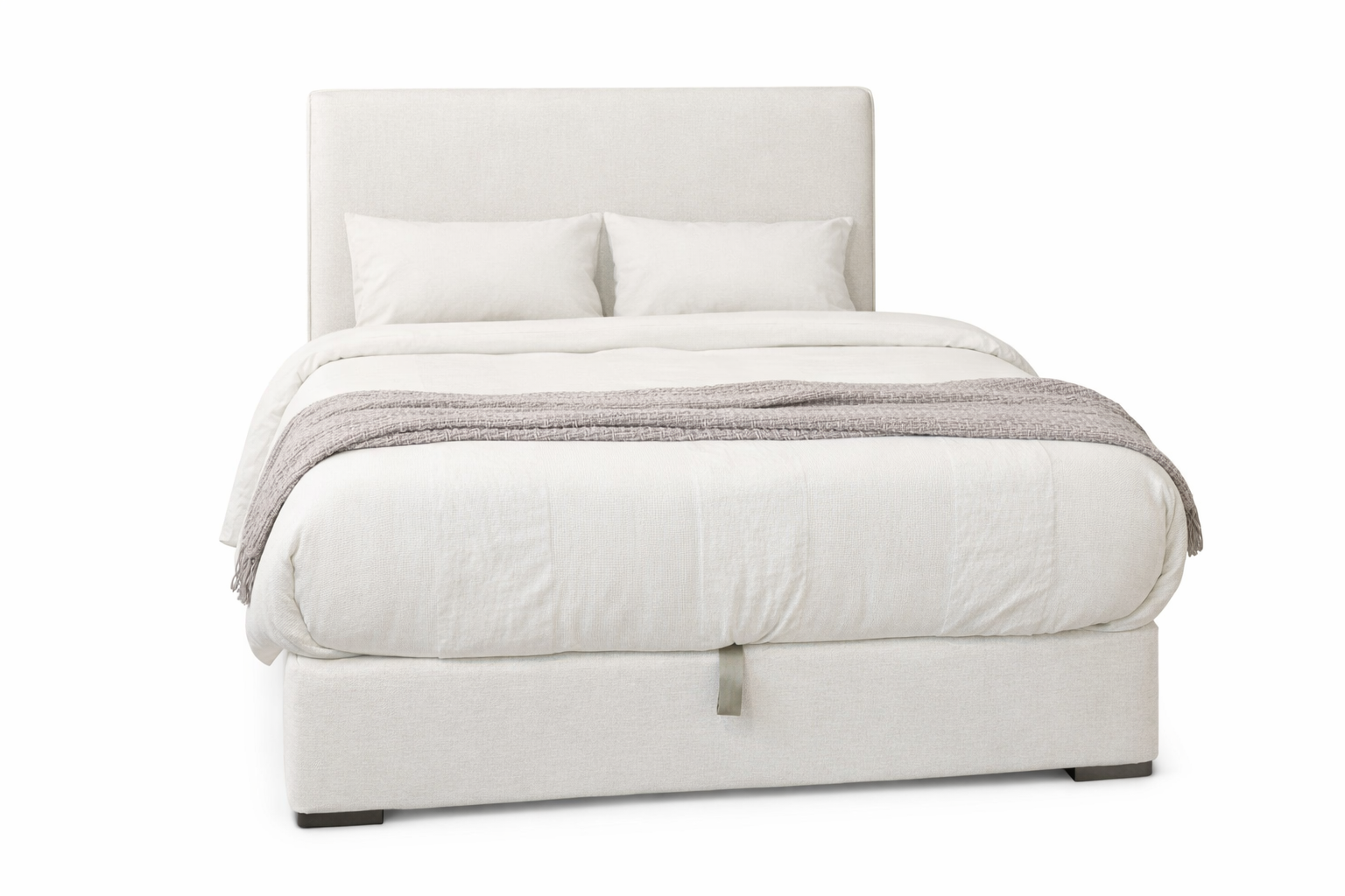 White bed with gray bedding on a white background