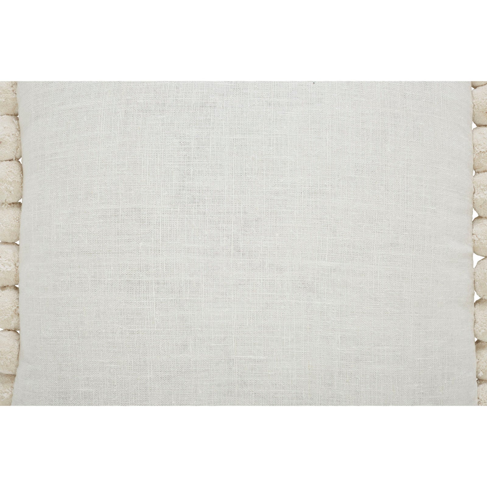 A square-shaped decorative pillow with solid pattern and pom pom detailing on the edges, primarily in a natural white color.