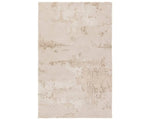 A beige and gray area rug with a textured design, hand tufted construction, and a viscose and wool blend.