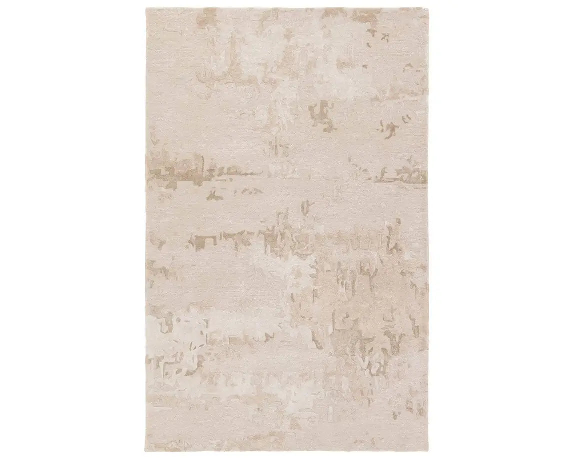 A beige and gray area rug with a textured design, hand tufted construction, and a viscose and wool blend.