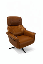 Brown leather armchair on a white background