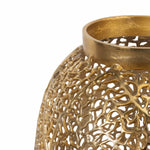 Gold decorative lantern with intricate patterns on a white background