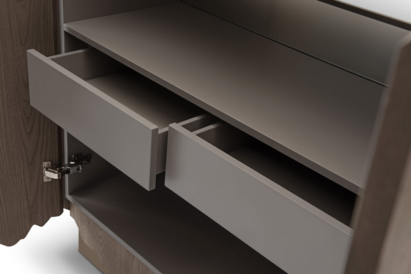 Close-up of a wooden cabinet with open drawers on a white background