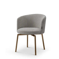 Gray upholstered chair with wooden legs on a white background