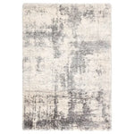 Gray and white textured area rug on a white background