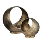 Two gold-colored decorative bowls with a textured surface, one larger and one smaller, displayed against a white background.