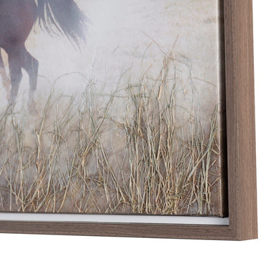 A hand-painted canvas wall art depicting a scene with horses running in an open field with mountains in the background.