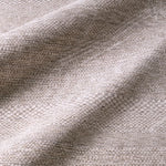 Close-up of textured gray fabric with a subtle pattern