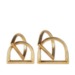 Pair of gold heart-shaped earrings on a white background