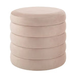 A beige fabric upholstered storage ottoman with a round top and cylindrical shape, featuring a tufted design.