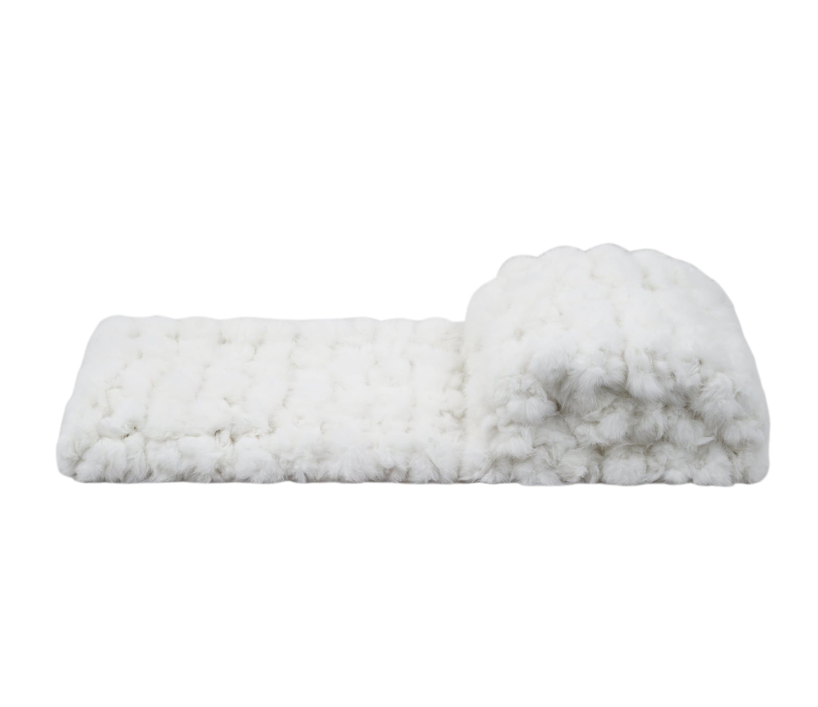 A folded white textured faux fur blanket with a ribbed pattern, shown on a white background 