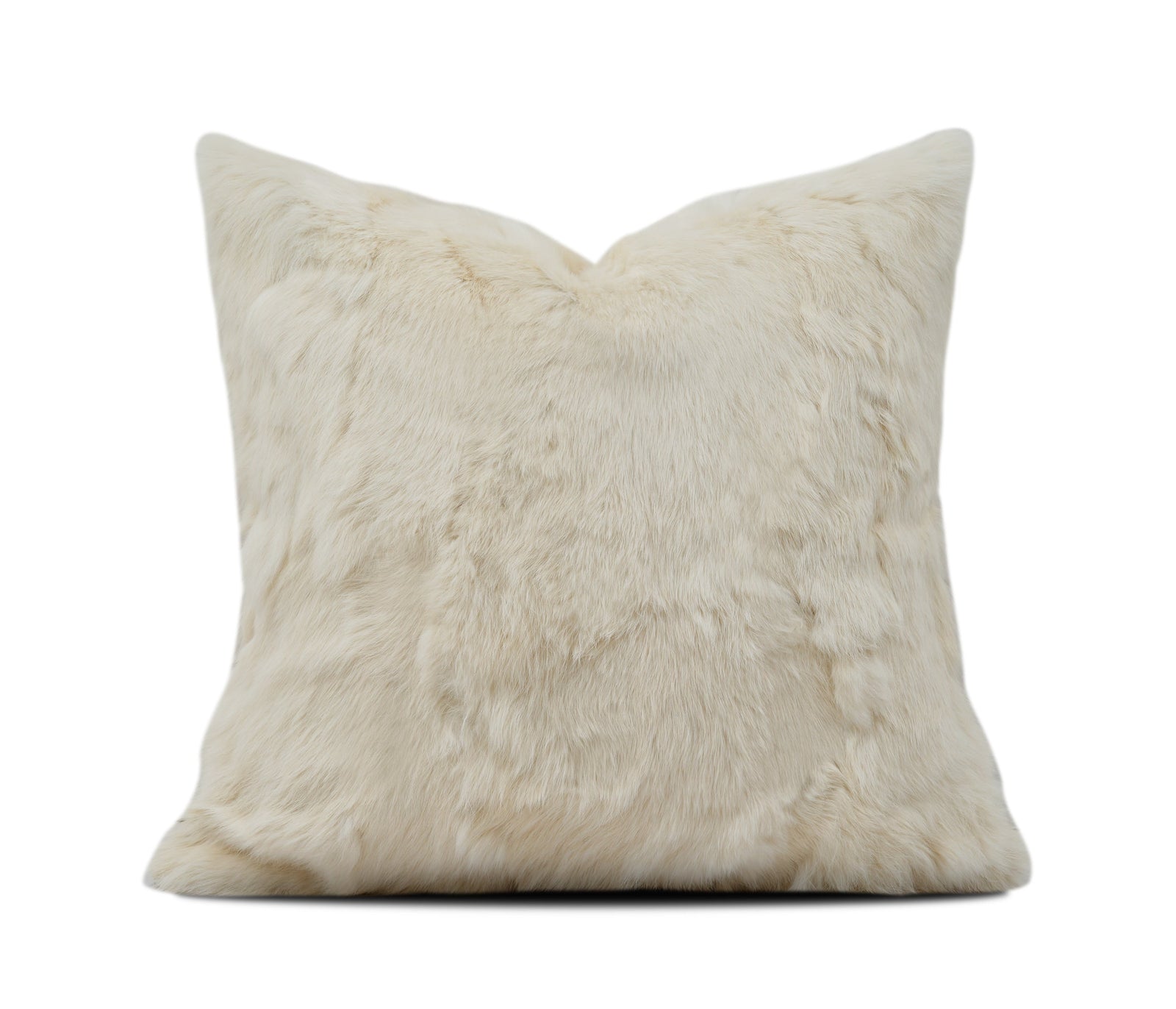 A square faux fur throw pillow in a warm cream or off-white color, shown against a plain white background 