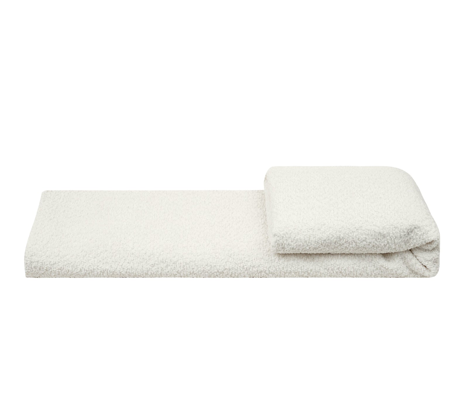 A folded white bath towel with a matching small folded square on top, displayed on a clean white background 