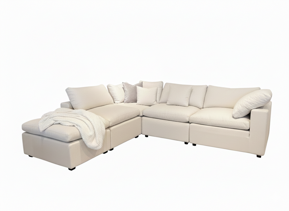Beige sectional sofa on a white background