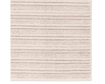 A beige and white striped area rug, power loomed with a flatweave construction.