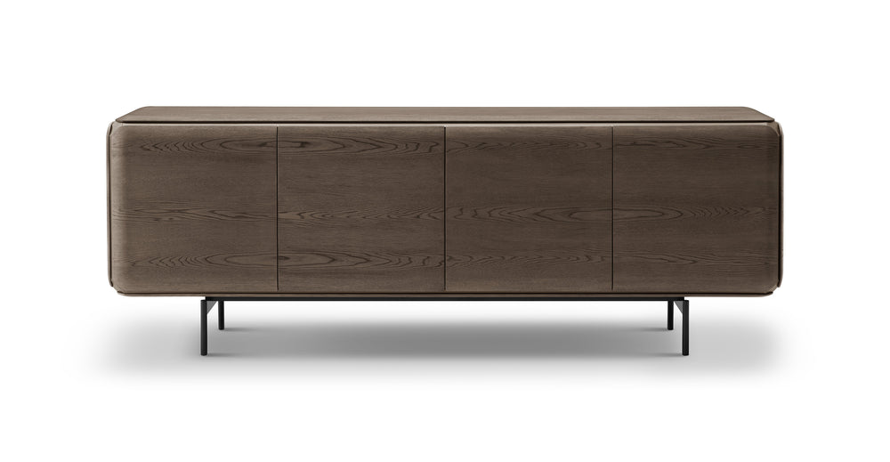 Brown wooden sideboard with four doors on a white background