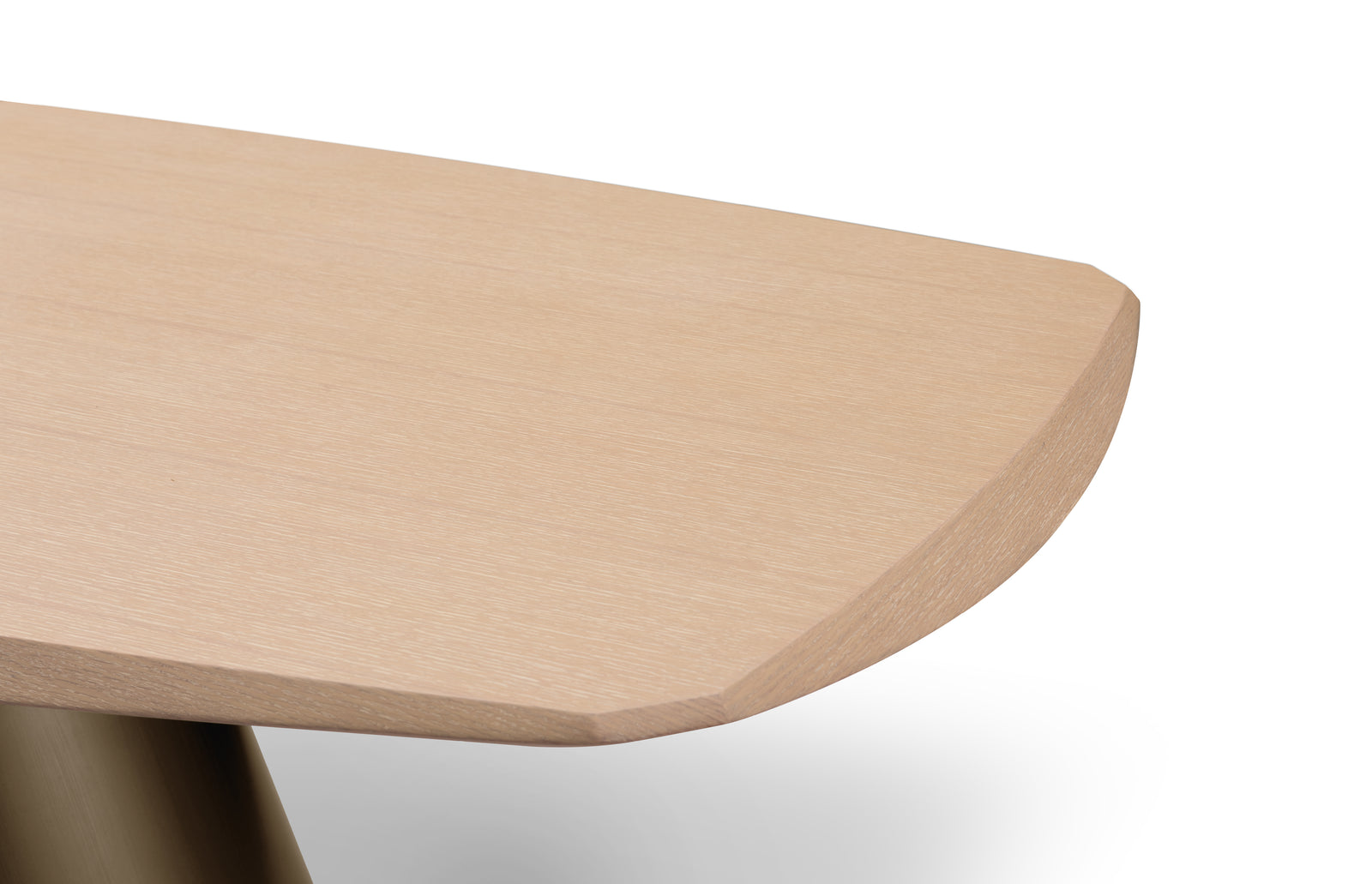 A modern dining table with a beige oval tabletop and a brown X-shaped pedestal base.