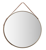 A round accent mirror with a metallic frame and a simple, elegant design.