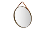 Round mirror with a brown leather strap on a white background