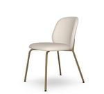 Beige chair with gold legs on a white background