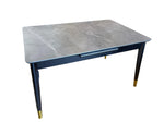 Table with a gray marble top and dark blue base on a white background