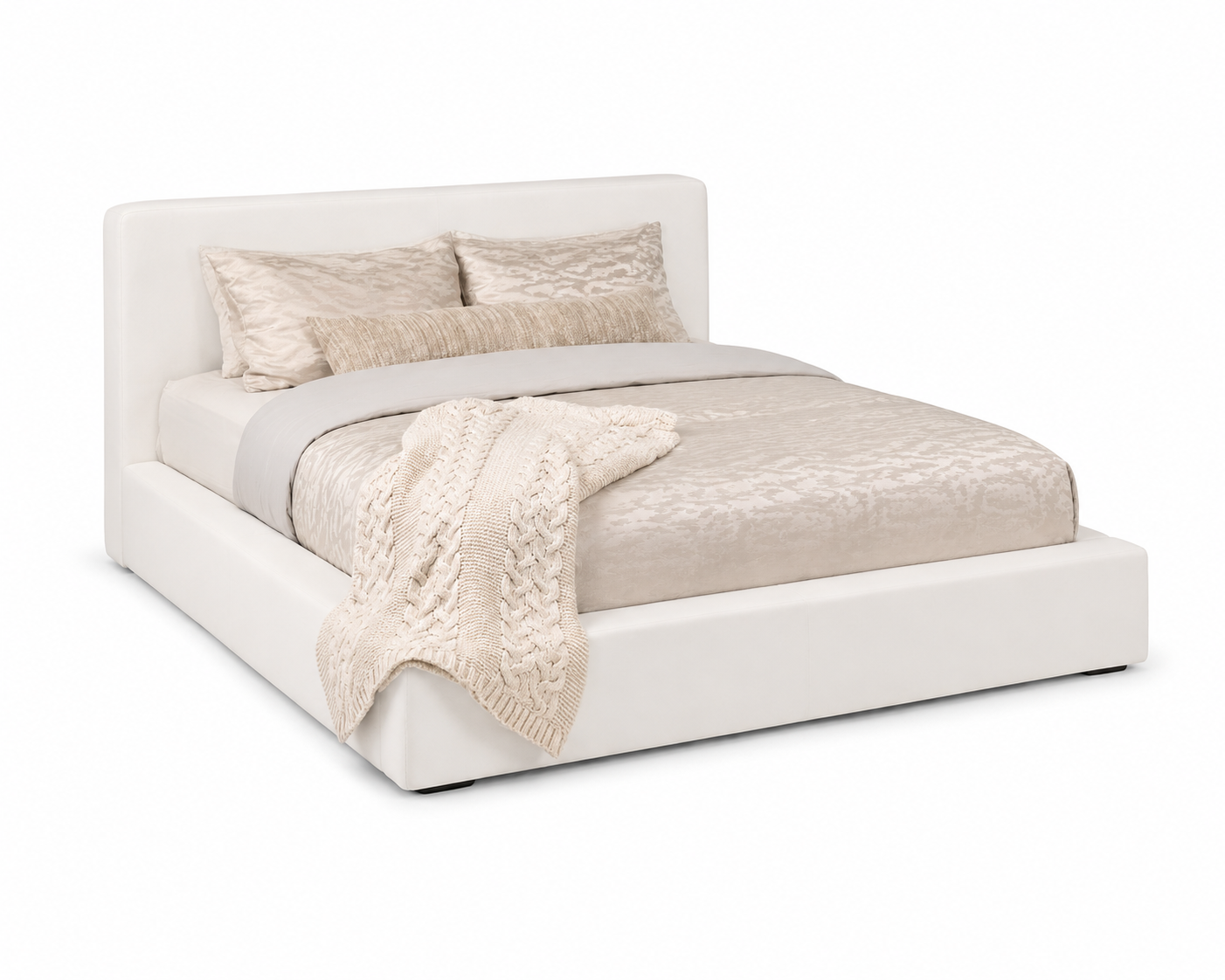 A white slipcover on a bed